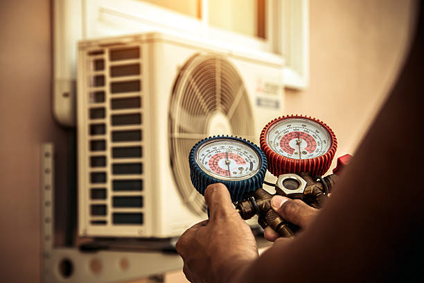Professional Ac Repair technician working in Marshfield Hills, MA